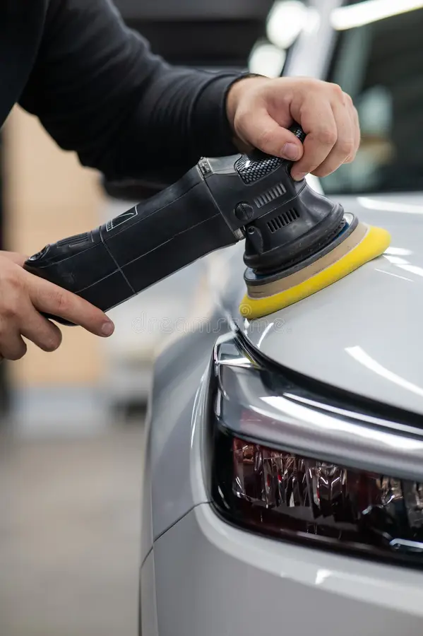 process-polishing-white-car-hood-surface-using-orbital-polishing-machine-vertical-photo-process-polishing-white-car-hood-305813433.jpg